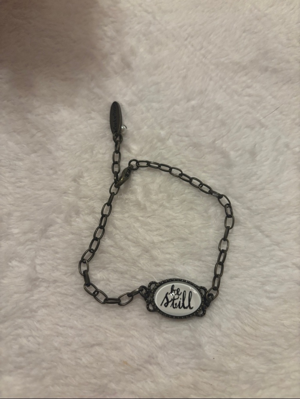 Plunder antique gold chain bracelet with white oval 'be still' sentiment